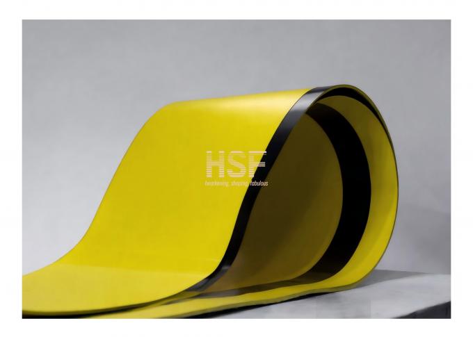 Close-up view of 80μm CPP Yellow-Black Embossed Film demonstrating cloth grain finish and color contrast